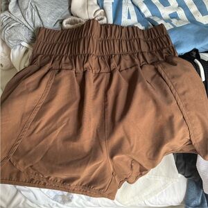 Brown “New In” High Waisted shorts.